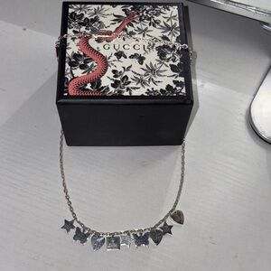 Gucci Silver Charm Necklace with Heart and Star Accents